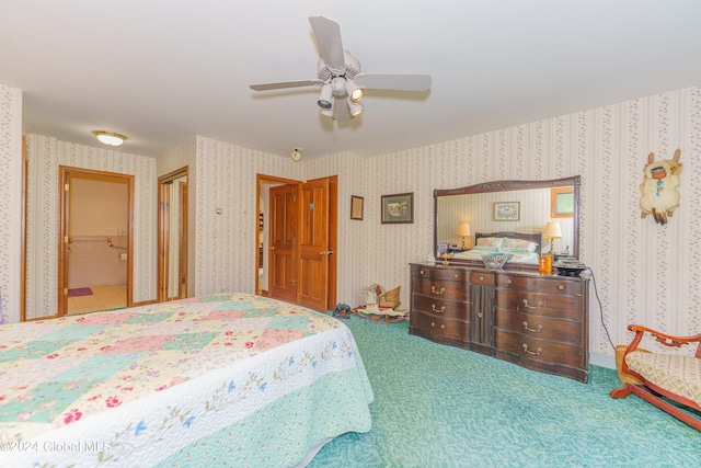 bedroom with carpet flooring, wallpapered walls, and a ceiling fan
