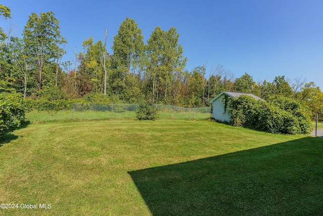 view of yard featuring fence