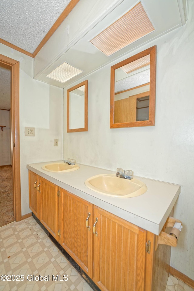 200 Summit Lake Rd, Argyle, NY 12809 - full bath featuring crown molding, double vanity, tile patterned floors, and a sink