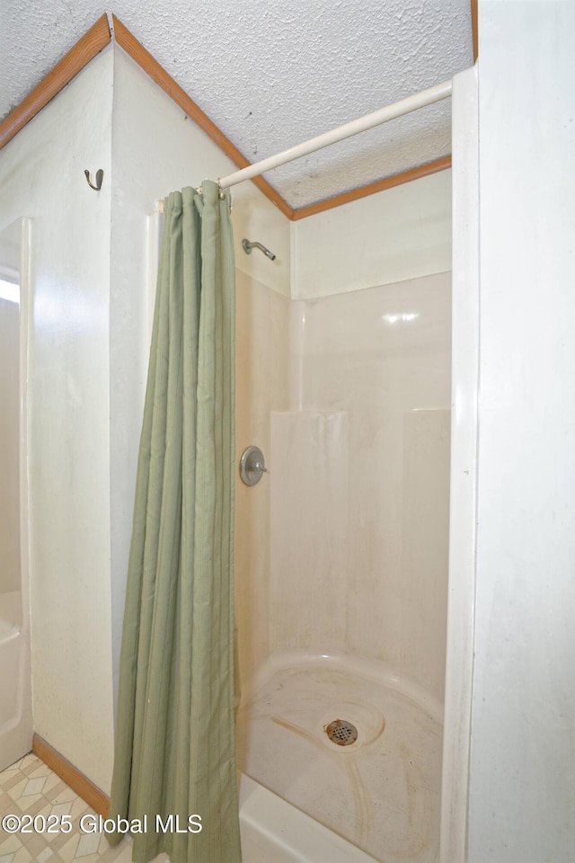 200 Summit Lake Rd, Argyle, NY 12809 - full bathroom featuring tile patterned floors, a shower with shower curtain, a textured ceiling, and a bathing tub