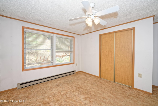 200 Summit Lake Rd, Argyle, NY 12809 - unfurnished bedroom featuring a textured ceiling, baseboard heating, and ornamental molding