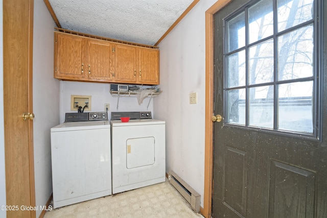 200 Summit Lake Rd, Argyle, NY 12809 - washroom featuring cabinet space, light floors, washing machine and clothes dryer, a baseboard radiator, and a textured ceiling
