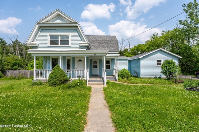 65 N Main St, Voorheesville, NY 12186 - view of front of house featuring covered porch, a shingled roof, and a gambrel roof