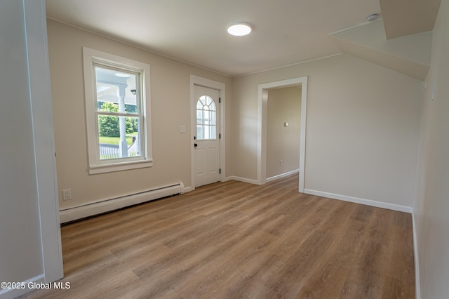 65 N Main St, Voorheesville, NY 12186 - entryway with a baseboard heating unit, light wood finished floors, and lofted ceiling