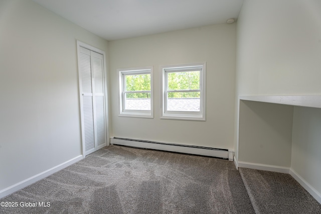 65 N Main St, Voorheesville, NY 12186 - unfurnished bedroom featuring baseboard heating, carpet flooring, and a closet