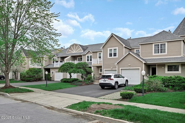 101 Kaydeross Park Rd, Saratoga Springs, Outside, NY 12866 - townhome / multi-family property with driveway, an attached garage, a shingled roof, a front yard, and a residential view