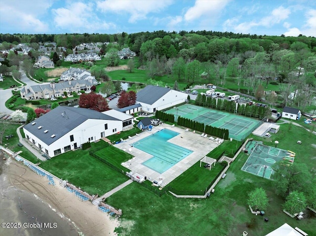 101 Kaydeross Park Rd, Saratoga Springs, Outside, NY 12866 - drone / aerial view of a pool and a heavily wooded area