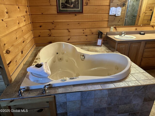 3210 Lake Shore Dr Unit 24Interval 2, Lake George, NY 12845 - bathroom with wooden walls, a whirlpool tub, and vanity