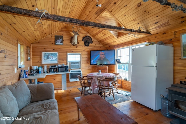 301 Lape Rd, Charleston, NY 12066 - living area featuring wooden walls, heating unit, wood ceiling, and wood-type flooring