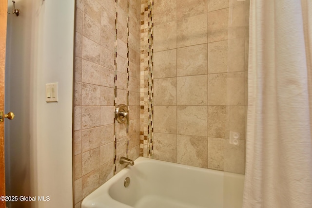 full bath featuring shower / bath combo with shower curtain