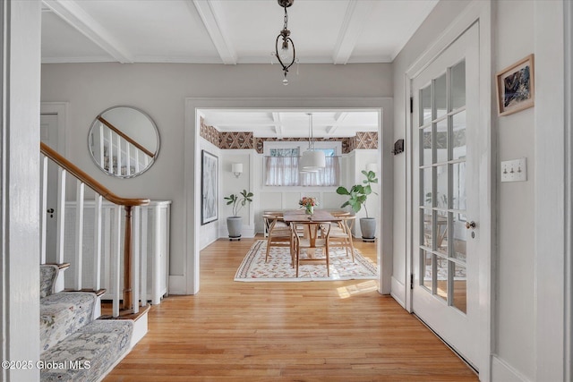 39 5th Ave, Saratoga Springs, NY 12866 - foyer entrance featuring beamed ceiling, light wood-type flooring, and stairs