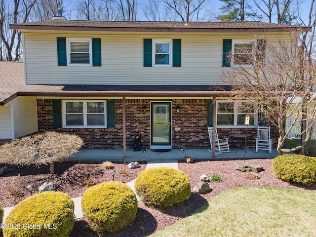 5 Cherry Hills Ct, Clifton Park, NY 12065 - view of front facade featuring brick siding and a porch