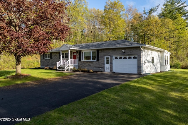 92 Vosburgh Rd, Halfmoon, NY 12118 - ranch-style home featuring an attached garage, driveway, and a front yard