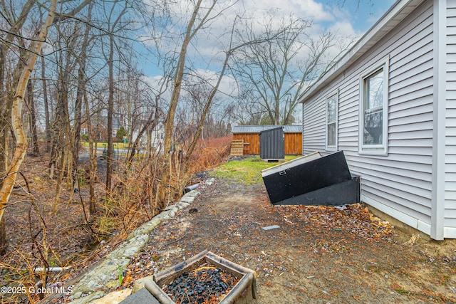 7 Arch Ave, Bethlehem, NY 12203 - view of yard with an outdoor structure and a storage unit