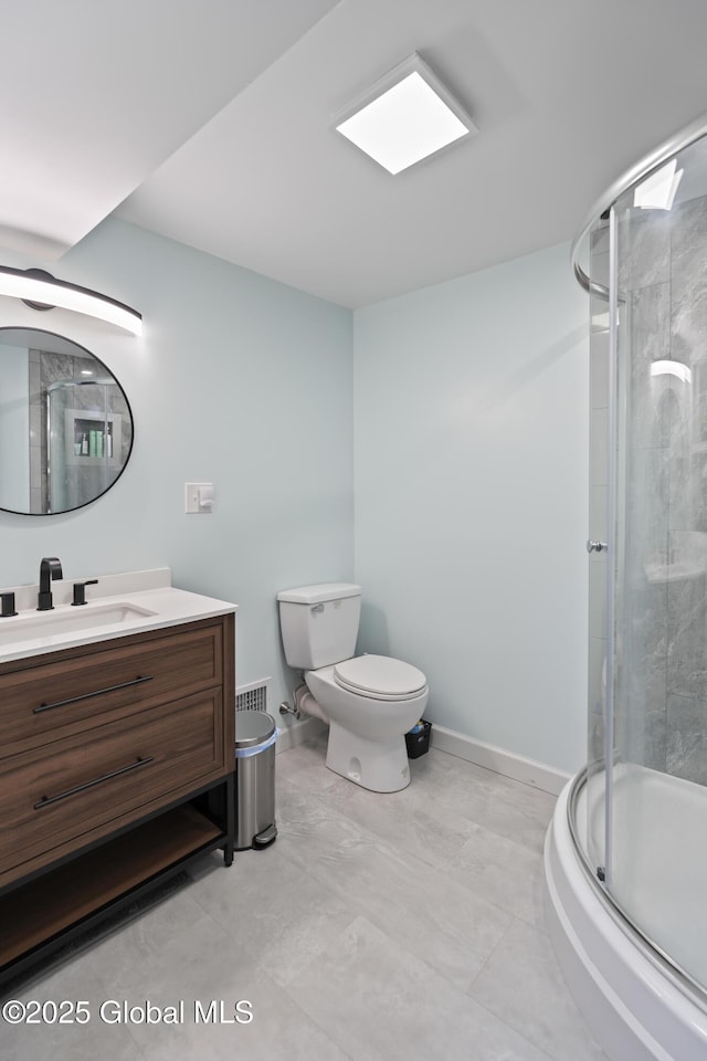 419 Brownell Rd, Malta, NY 12020 - full bath with toilet, vanity, baseboards, and a shower with door