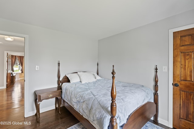 419 Brownell Rd, Malta, NY 12020 - bedroom featuring baseboards and wood finished floors