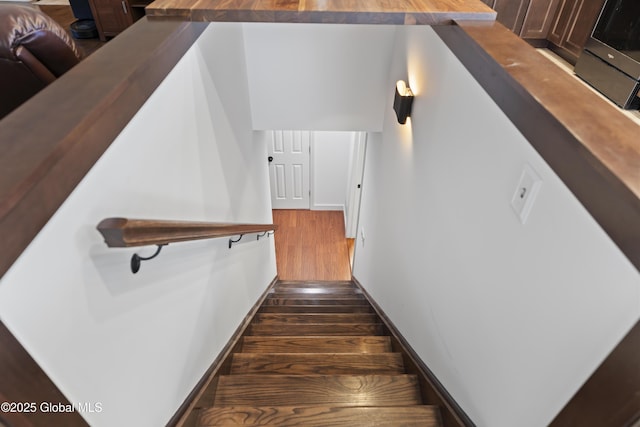 419 Brownell Rd, Malta, NY 12020 - staircase with baseboards and wood finished floors