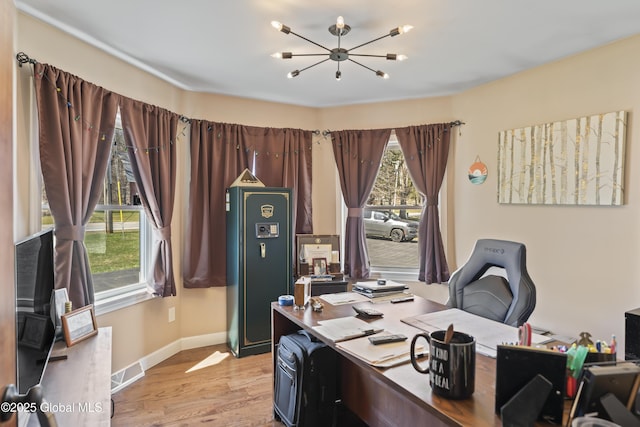 419 Brownell Rd, Malta, NY 12020 - home office featuring a chandelier, light wood finished floors, baseboards, and visible vents