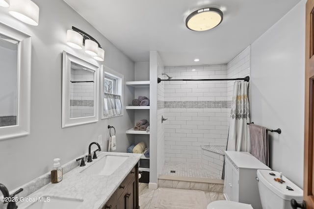 419 Brownell Rd, Malta, NY 12020 - bathroom with a sink, toilet, and tiled shower