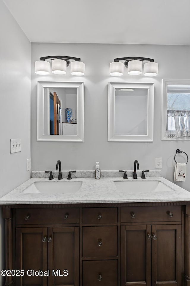 419 Brownell Rd, Malta, NY 12020 - full bathroom featuring a sink and double vanity