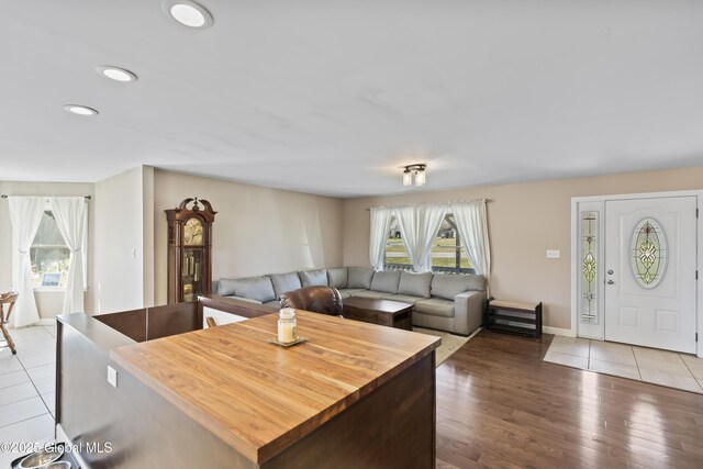 419 Brownell Rd, Malta, NY 12020 - living room featuring recessed lighting, light wood-style floors, baseboards, and a healthy amount of sunlight