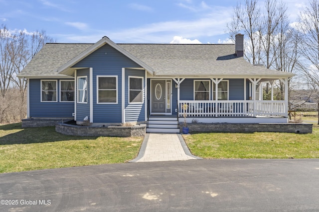 419 Brownell Rd, Malta, NY 12020 - view of front of home with a porch, a shingled roof, a front lawn, and a chimney