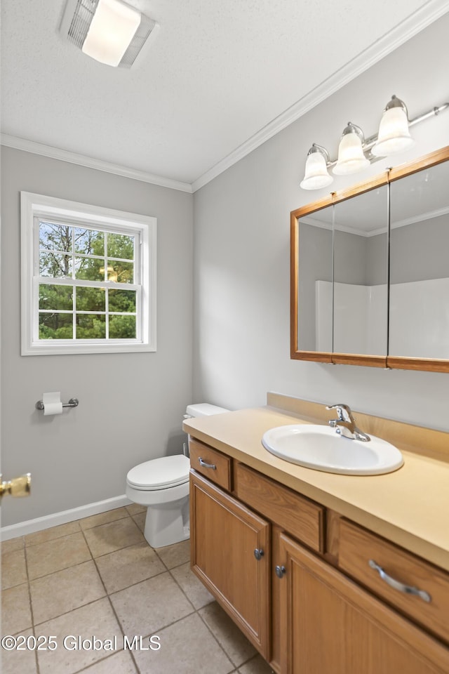 bathroom with crown molding, tile patterned flooring, vanity, toilet, and visible vents