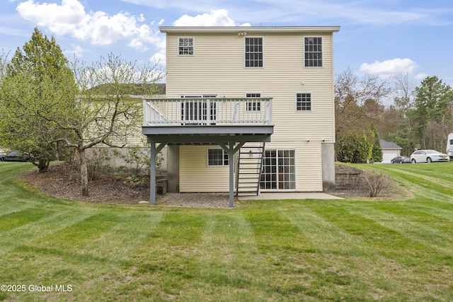 back of property featuring a lawn and a deck