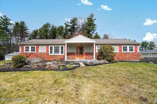 ranch-style house featuring a front lawn and brick siding