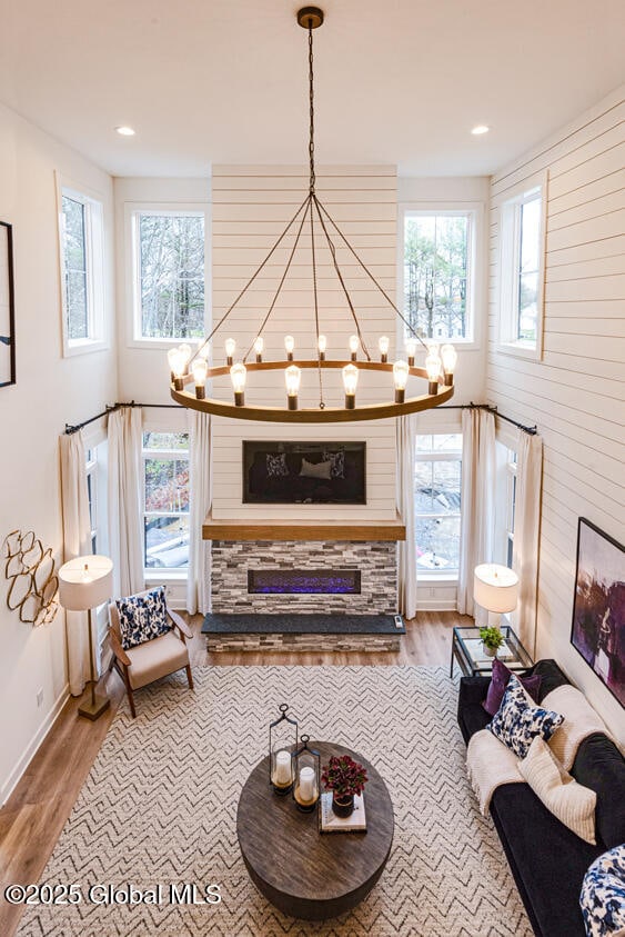 16 Bergen Pl, Niskayuna, NY 12309 - living room featuring a chandelier, wood finished floors, baseboards, and recessed lighting