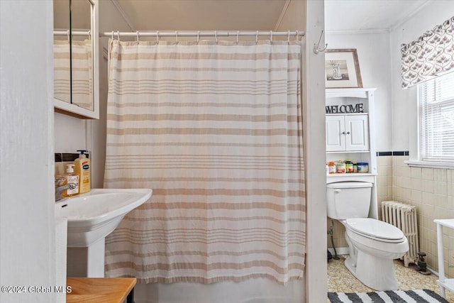 full bathroom featuring shower / tub combo, crown molding, toilet, radiator, and tile walls