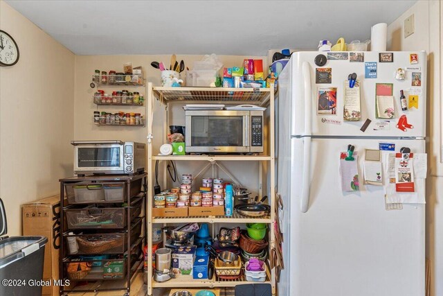 storage area featuring a toaster