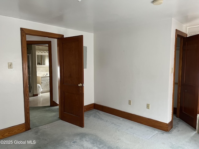 22 Williams St, Whitehall Village, NY 12887 - unfurnished bedroom featuring baseboards and carpet