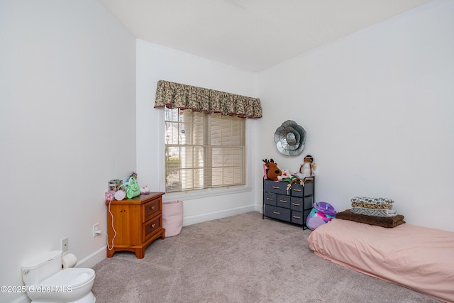 bedroom with baseboards and carpet flooring