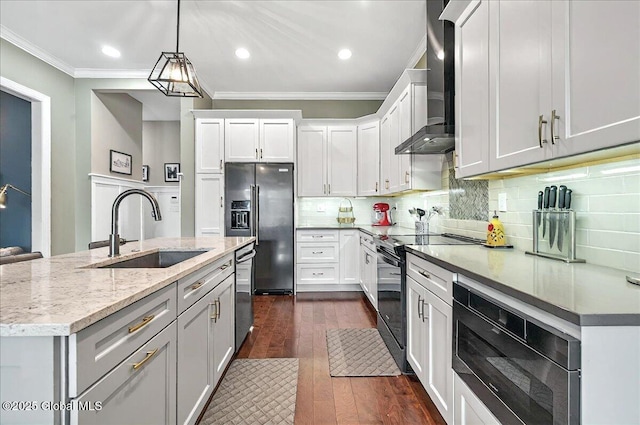 kitchen with wall chimney range hood, a sink, built in microwave, refrigerator with ice dispenser, and black range with electric stovetop