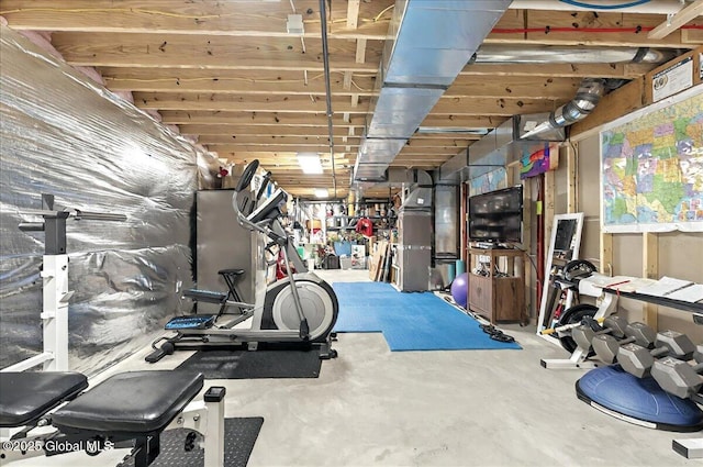 exercise area featuring heating unit