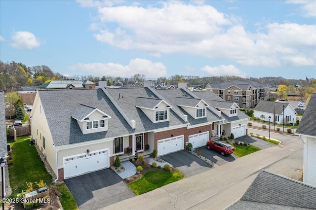 bird's eye view with a residential view
