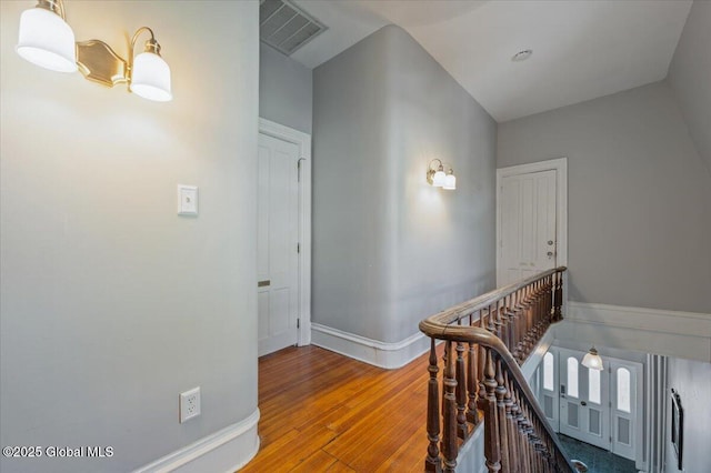 49 W High St, Ballston Spa, NY 12020 - hallway with wood finished floors, an upstairs landing, and baseboards
