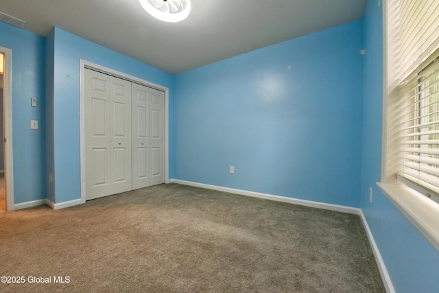 1003 Grayson Pl, Schenectady, NY 12302 - unfurnished bedroom featuring carpet floors and a closet