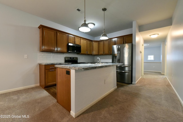 1003 Grayson Pl, Schenectady, NY 12302 - kitchen with black microwave, stainless steel fridge, dark colored carpet, and range with electric cooktop