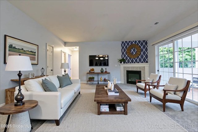 1003 Grayson Pl, Schenectady, NY 12302 - living room with a fireplace and light colored carpet