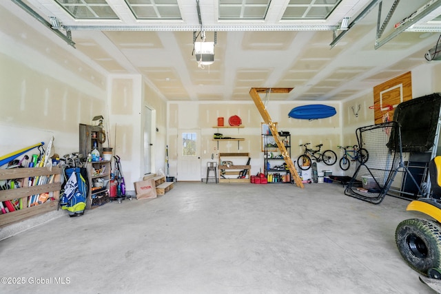 garage featuring a garage door opener
