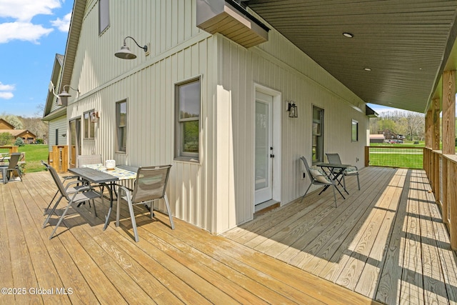 deck featuring outdoor dining space