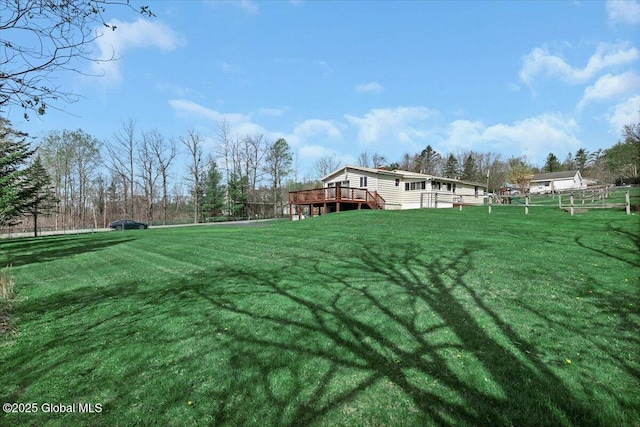 view of yard with a deck