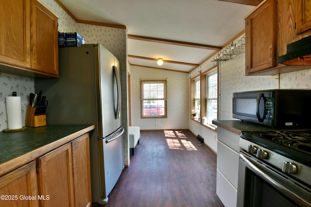 kitchen with vaulted ceiling, wallpapered walls, black microwave, dark wood-style floors, and gas range
