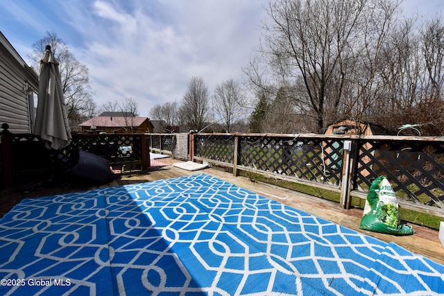 view of patio / terrace featuring a wooden deck