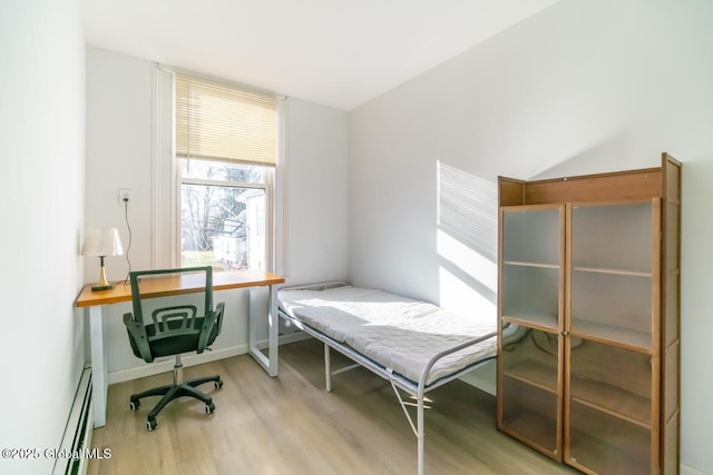 1621 Highland Ave, Troy, NY 12180 - bedroom with light wood-style flooring and baseboard heating