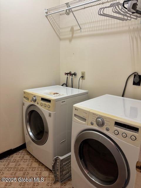 3 Osborne St, Albany, NY 12202 - laundry area featuring baseboards, laundry area, and washer and clothes dryer