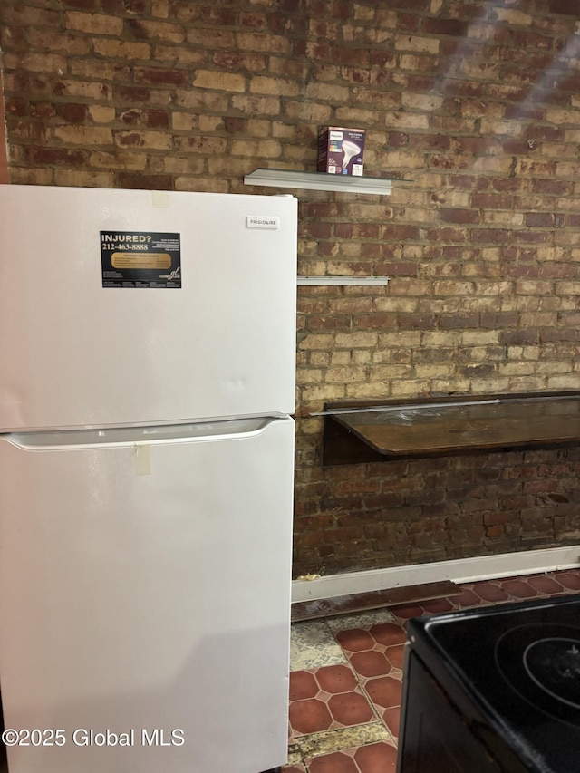 3 Osborne St, Albany, NY 12202 - interior space with black range with electric stovetop and freestanding refrigerator