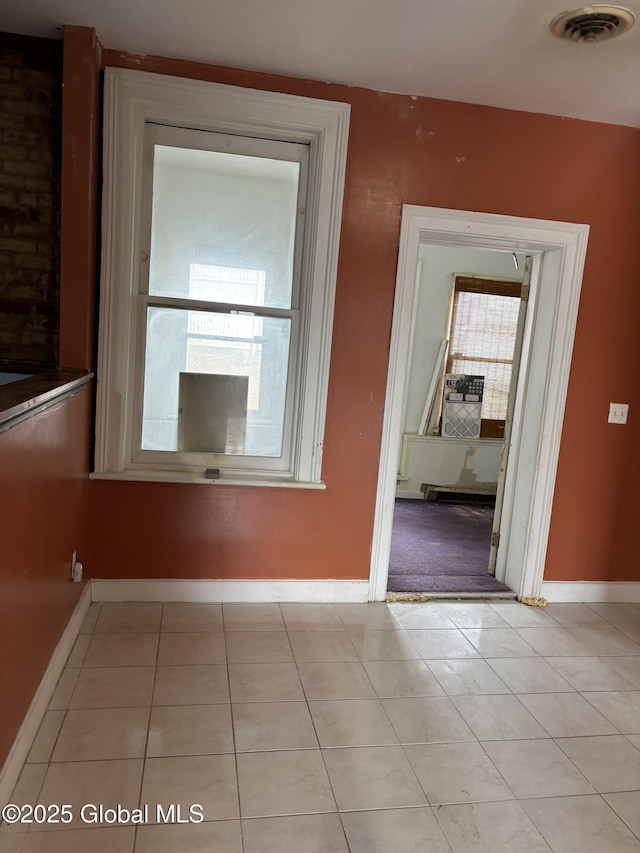 3 Osborne St, Albany, NY 12202 - unfurnished room featuring light tile patterned flooring, visible vents, and baseboards